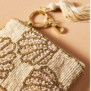 Anthropologie Beaded Shell Coin Purse NWT in gold, white, and cream